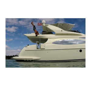 Jumping off of a Lillipad Boat Diving Board on a yacht. Also known as Lily Pad Diving Board
