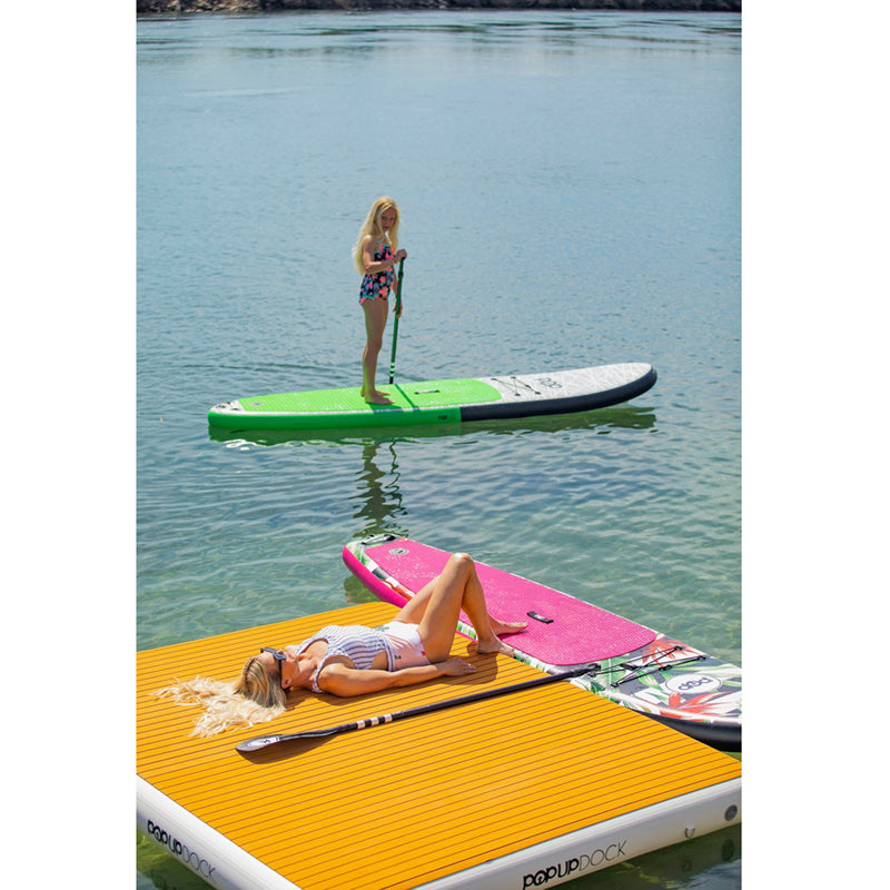 Royal Hawaiian SUP Mint-Black and Pink-black on the water.