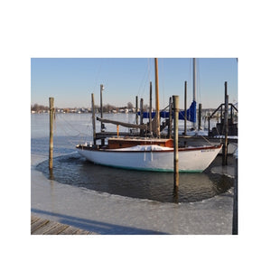 A PowerHouse Ice Eater for Sale is protecting a sailboat in a dock from ice damage. Multiple PowerHouse Ice Eater Dock DeIcers can be used together with other Power House Ice Eaters for Sale to build a dock buller system from several dock deicers. Full dock ice protection will ensure the safety of your investments.