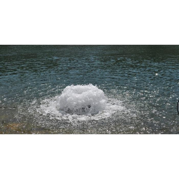 Bearon Aquatics F1000DP Surface Aerator in the water creating a boiling affect.