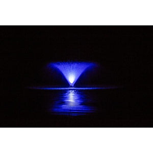 Power House F1000F 115v-230v 1 Hp Aerating Fountain being lit up by a blue Light Kit on a pitch black night, reflection can be seen off the water.