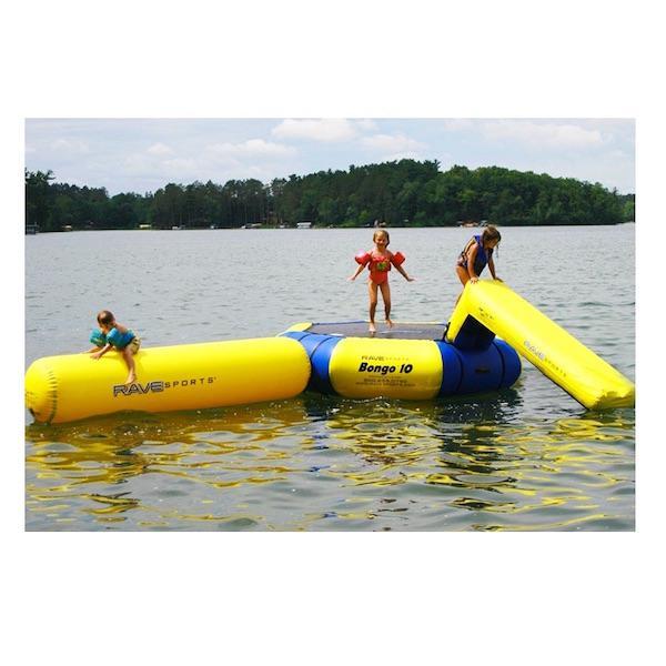 3 kids play on the Bongo 10 Water Park with slide and aqua lanch.