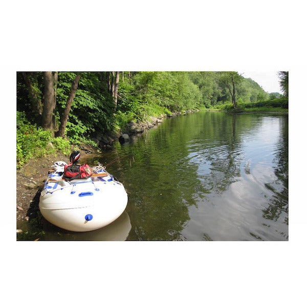 Sea Eagle 9 Inflatable Boat in the water on a river. 