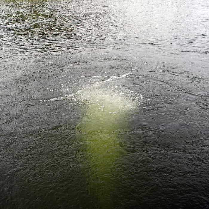 Close up view of the Scott Aerator Bubble Pro Sub-Surface Aerator aerating the pond.