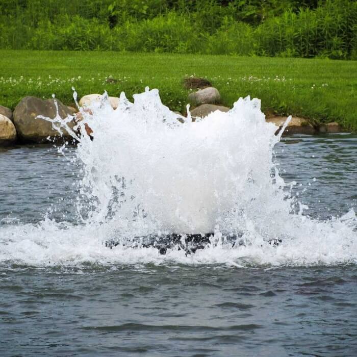 Closeup view of a Scott Aerator 1½ Hp Boilermaker Aerator in a pond.