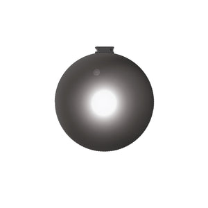 ScubaJet BEAM 1,500 Lumen LED Light. Black circle shape with a bright white light in the middle