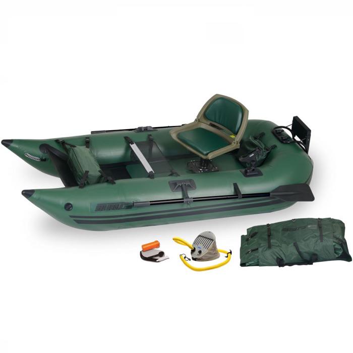 Top Side view of the green Sea Eagle 285 Frameless Inflatable Fishing Boat with carry bag and pump sitting next to the Sea Eagle inflatable boat.