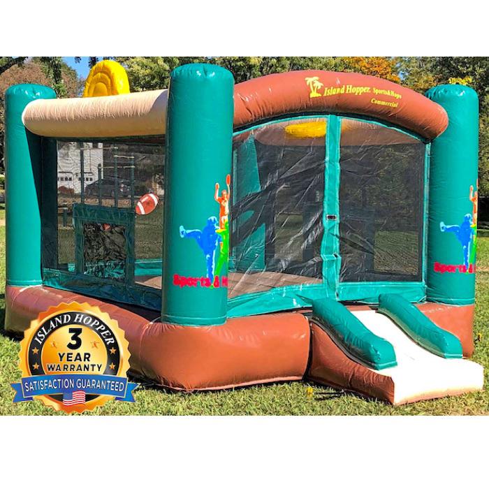 Island Hopper Sports N Hops Commercial Bounce House for Sale is shown on a white background. This best commercial bounce house for sale features green, brown, and tan colors with yellow highlights. It is a square inflatable bounce house with a small and not steep entry and exit slide.