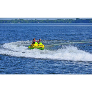 Rave #Stoked 2 Person Towable Boat Tube being pulled on the lake with 2 riders. 