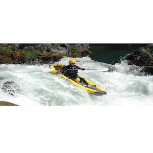 Man paddling through some whitewater rapids in a yellow Advanced Elements StraitEdge 1 Person Inflatable Kayak