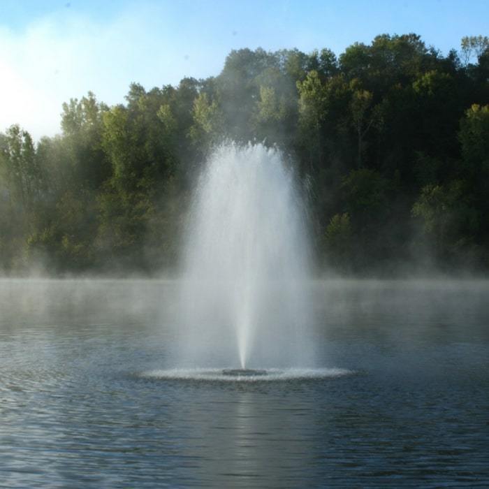 Kasco 3 HP 3.3JF Floating Pond Fountain - Lake Fountain flowing in the middle of a pond.