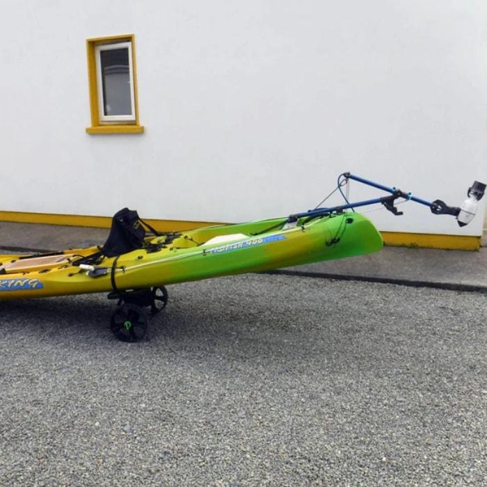 Universal Kayak and Canoe Adapter attached to a yellow-green kayak on display