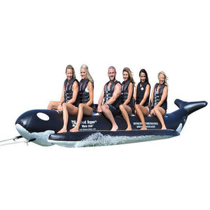 Island Hopper Whale Ride 6 Person Banana Boat side view with 6 people sitting on the inline seating.  Black and white killer whale design for extra fun.