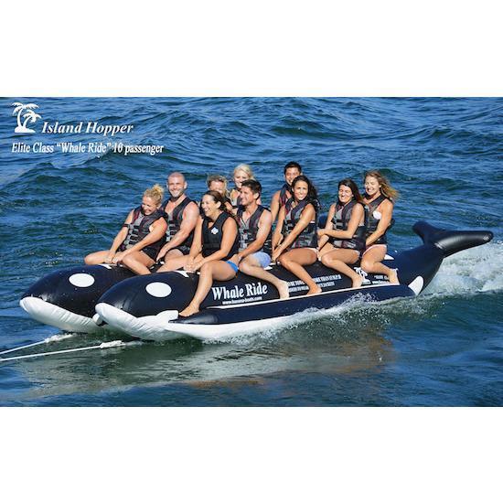 Island Hopper 10 Person Banana Boat Tube Whale Ride gliding across the water full of 10 passengers. 