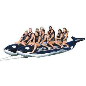 Island Hopper 10 Person Banana Boat Tube Whale Ride front side view.  Full of 10 passengers on the black and white Whale Ride Banana Boat that has each of the 2 side by side inflatable tubes made to look like a killer whale.