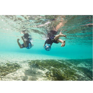 Yamaha Explorer Sea Scooter underwater view from behind.  The water is crystal clear and you can clearly see the Yamaha underwater scooters being held underneath them as the flow through the water.