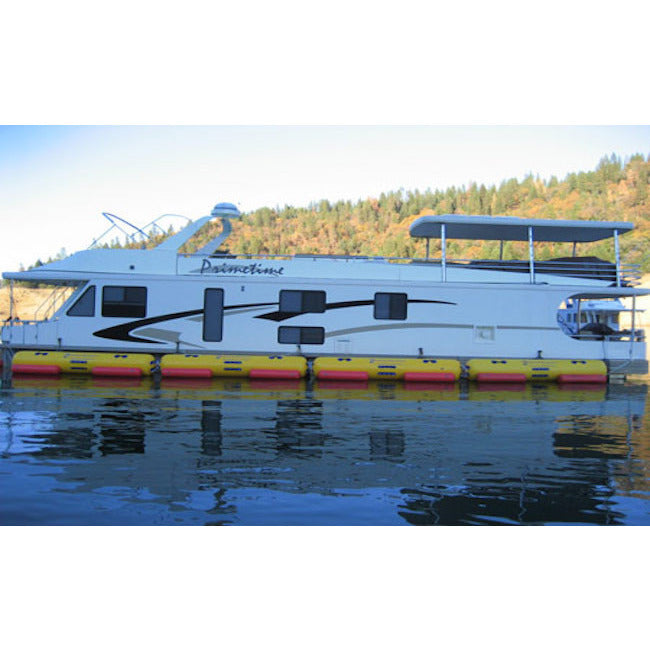 Island Hopper Island Runner Water Trampoline Attachments lining the side of big boat.