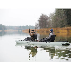 This is the Grey KingFisher Tandem Modular Fishing Kayak out in the lake with 2 people fishing on it.