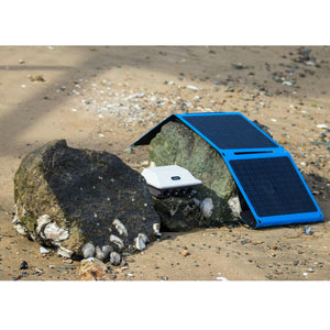 PP-166 Power Station & Solar Panel Bundle Kit on a rock in the beach