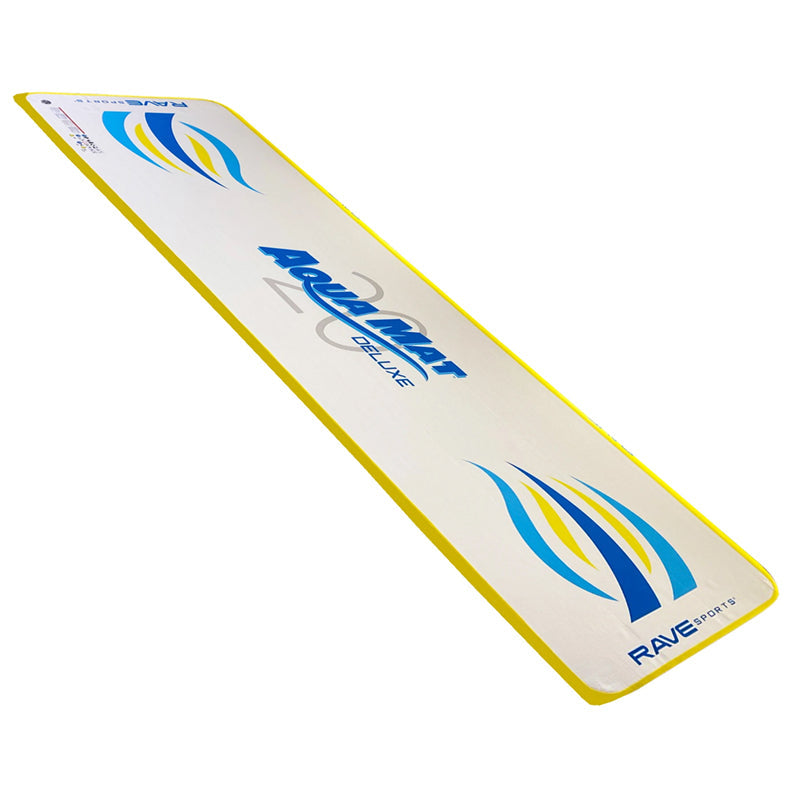 Aqua Mat Deluxe 20ft. All white top surface with royal blue, light blue, and yellow highlights. Says &#39;Aqua Mat Deluxe&#39; over a gray 20 on the water mat. The border is yellow